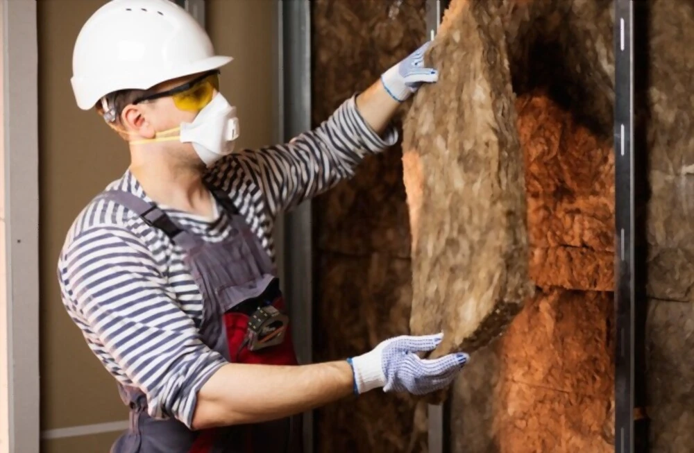 Person in protective wear, gloves