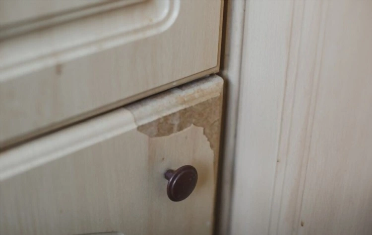 kitchen cabinets in need of repair chips and cracks